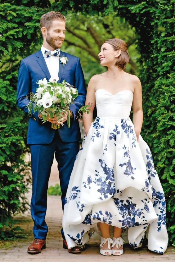 Choose a Non-white wedding dress, such as this modern floral design. 