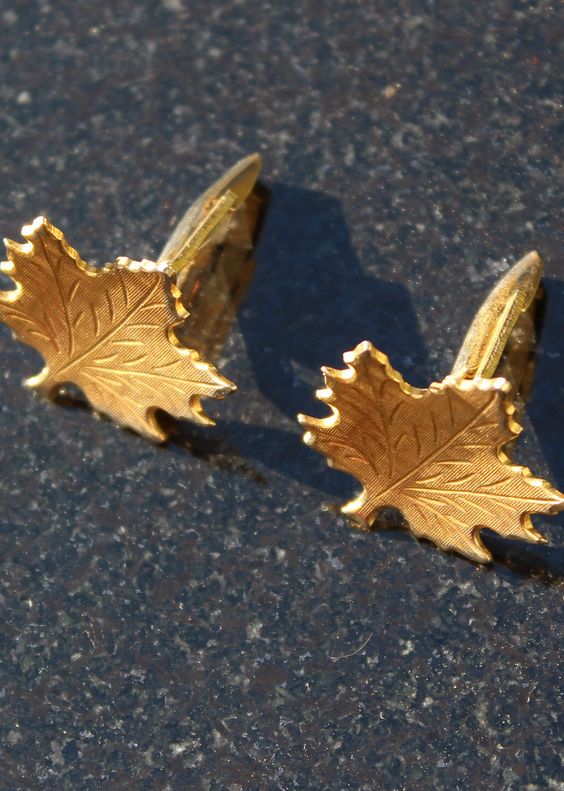 Use maple leaf cuff links or earring at your fall wedding. These cuff links can be found on Etsy.