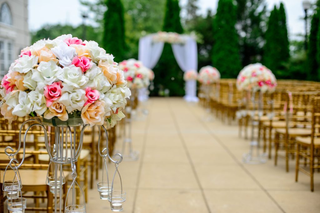 Fake Flowers Along Wedding Aisle