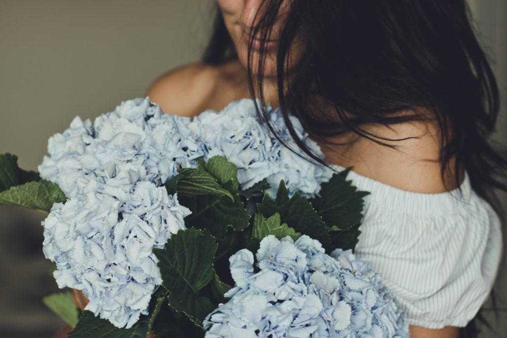Women with Something Blue Flowers