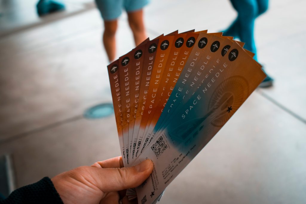 person holding tickets