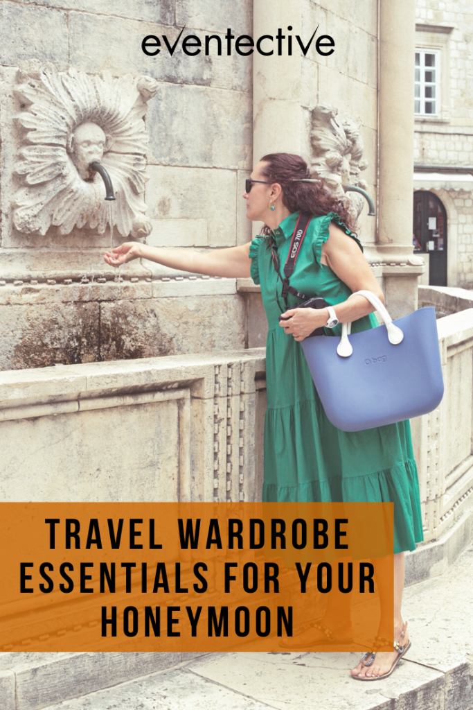 image of woman in green dress with blue tote bag. overlay text says "travel wardrobe essentials for your honeymoon"