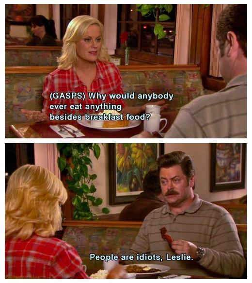 Leslie Knope and Ron Swanson eating breakfast foods on Parks and Rec