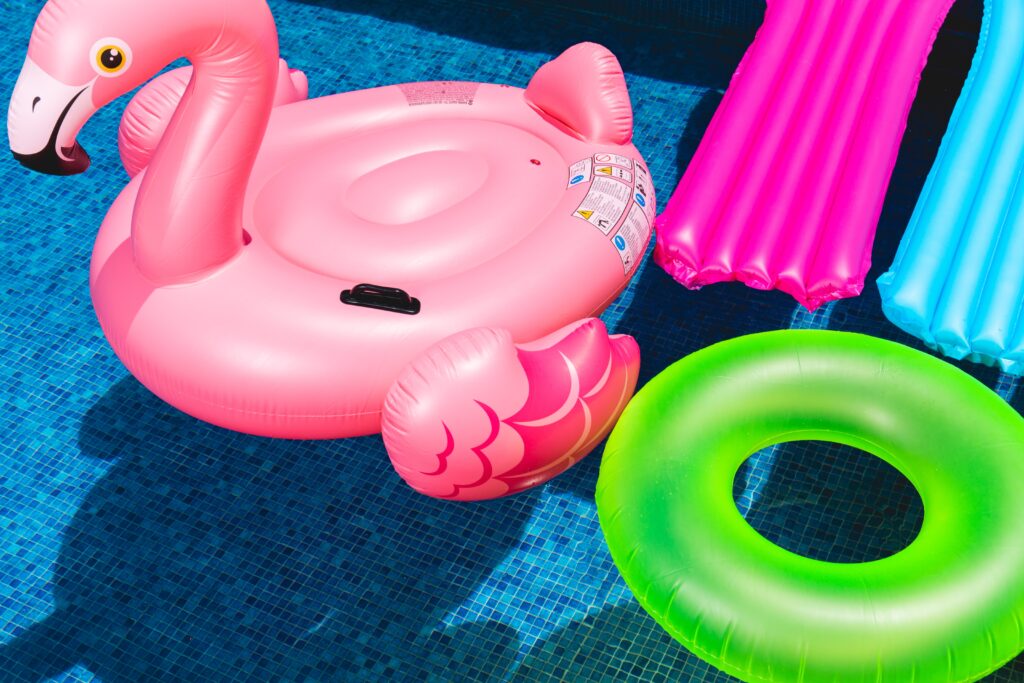 Brightly-colored pool floaties.