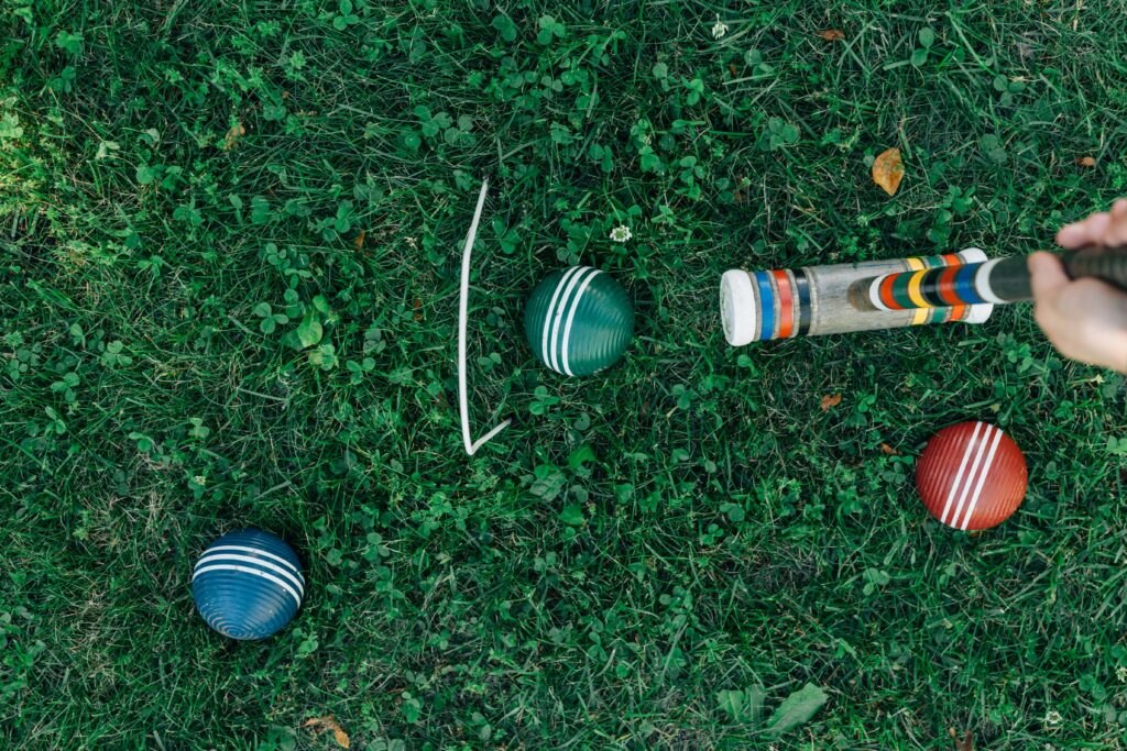 Croquet set in the grass at a wedding reception