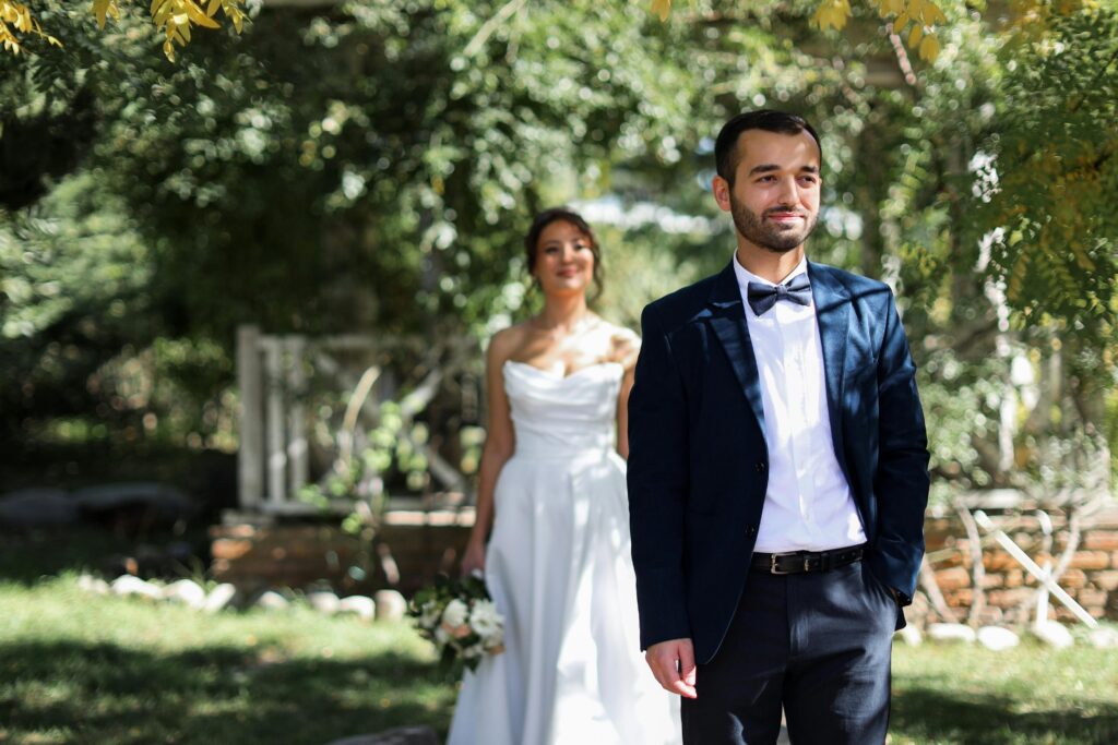Bride and groom's first look in a garden