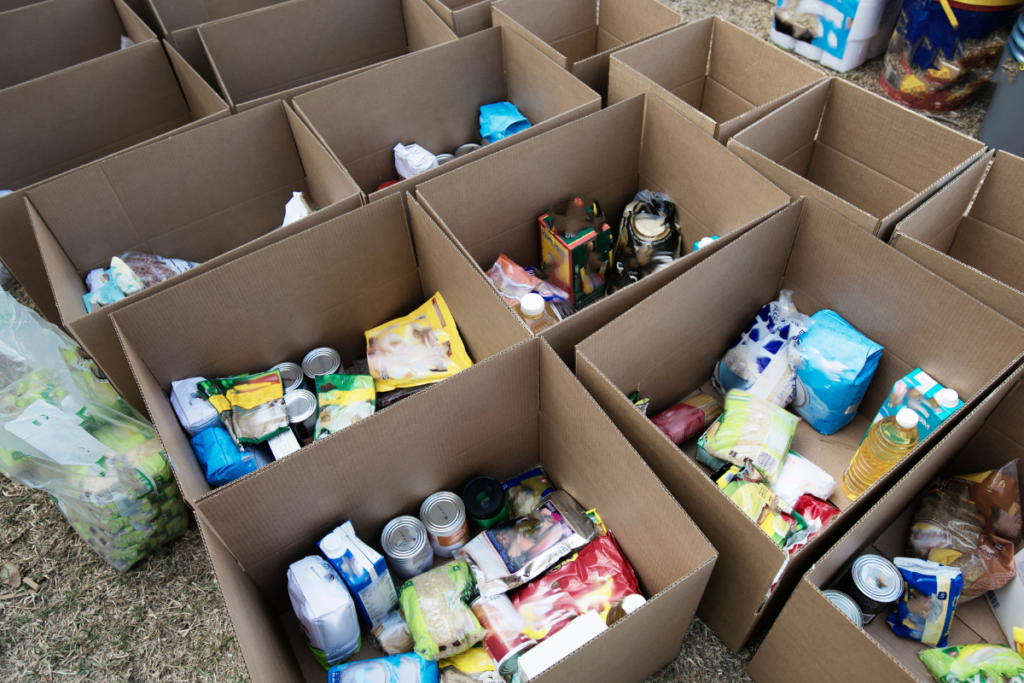 Canned goods and pantry items organized in boxes