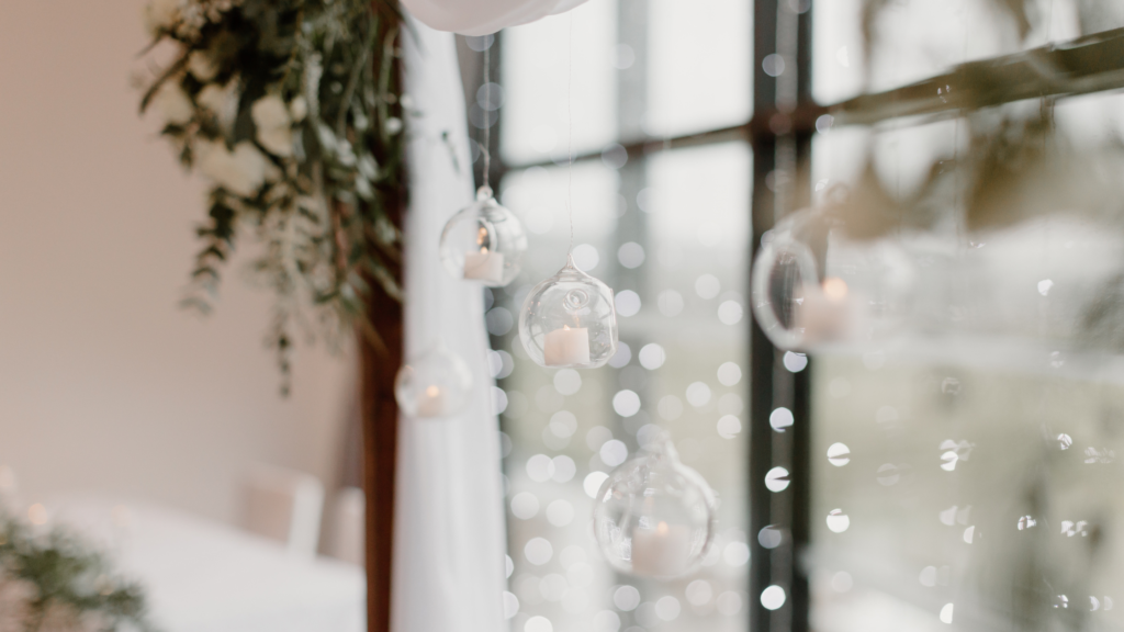 Candle display by a window