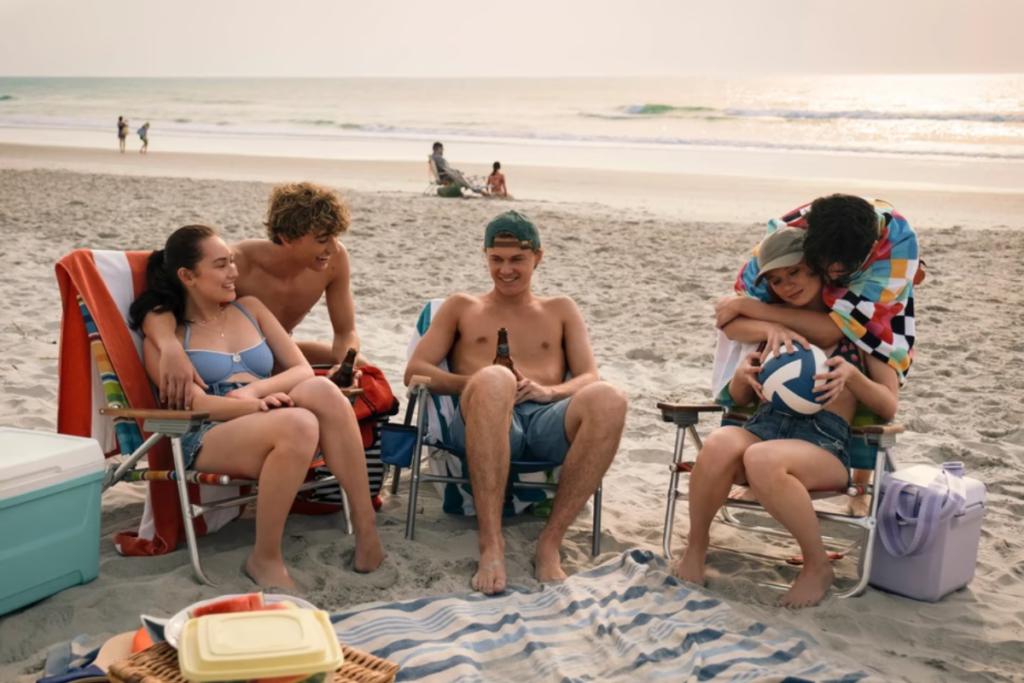 The cast of the Summer I Turned Pretty relaxing at the beach