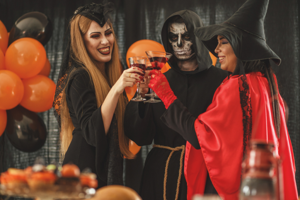 Men and women dressed up at a Halloween party