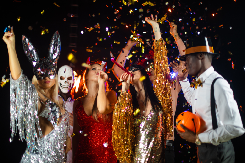 Men and women dressed up at a Halloween party