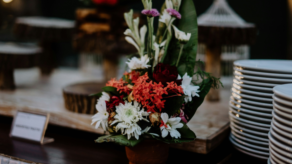 Simple floral arrangement on a buffet table