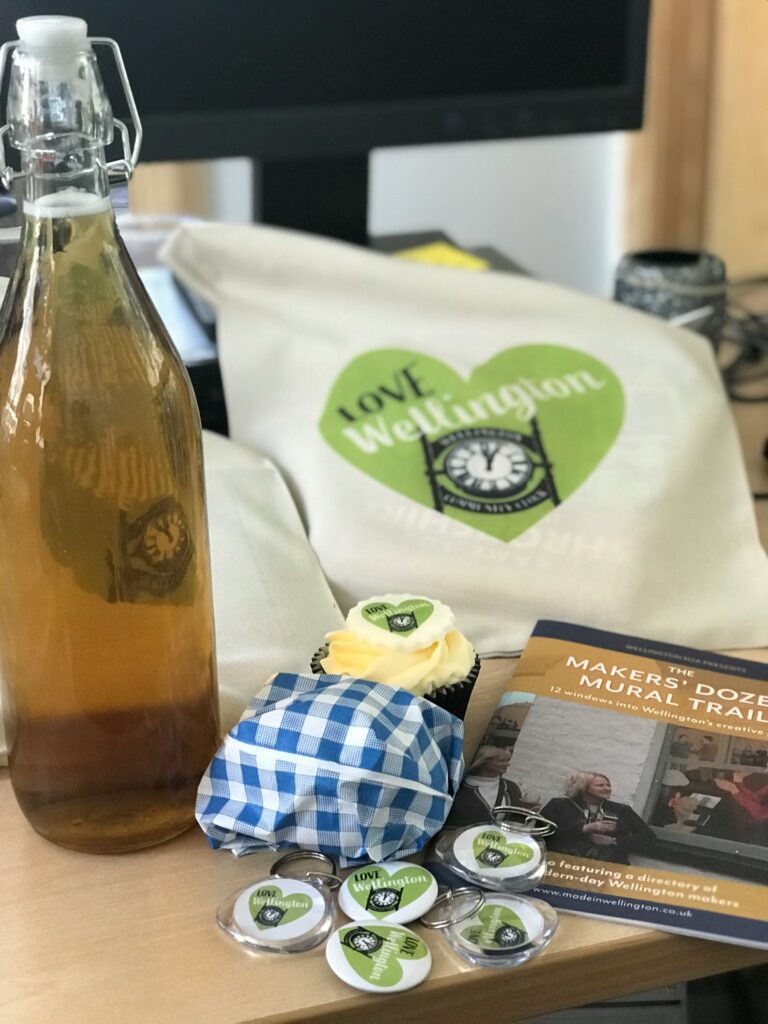 Customized Wellington swag: canvas bag, cupcakes, and keychains