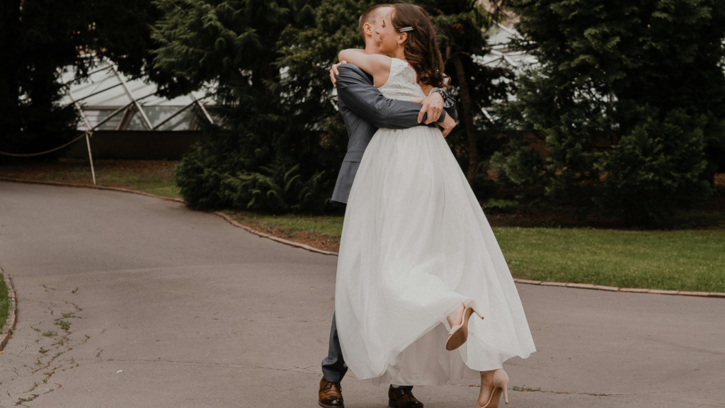 Bride and groom hugging each other
