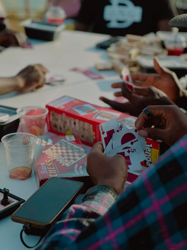 Friends playing board and card games